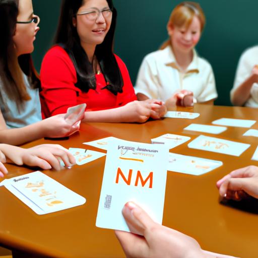 Hình ảnh một giáo viên và học sinh vây quanh một bàn, sử dụng flashcard bảng chữ cái để học tiếng Việt.